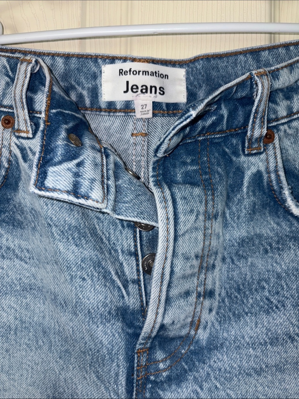 Reformation Distressed High-Rise Denim Shorts in Light Blue Wash